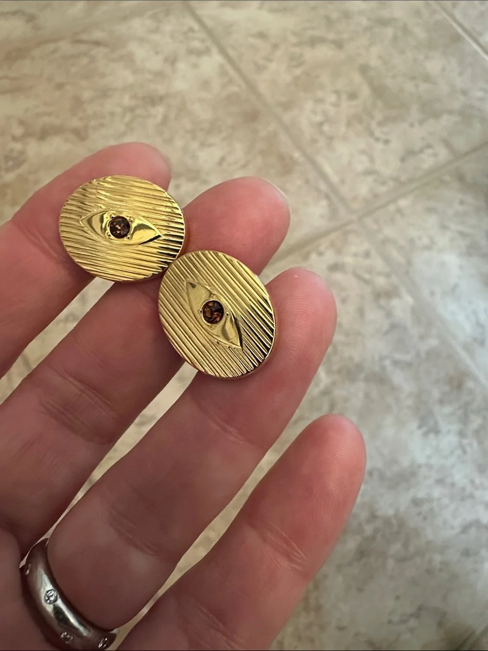 Gold Oval Cufflinks with Garnet Center